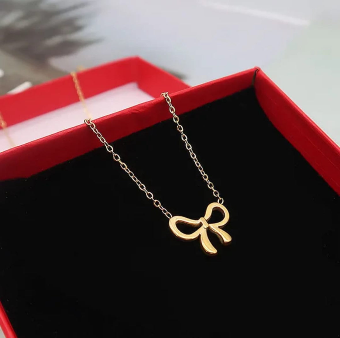 Golden Bow Pendant Necklace