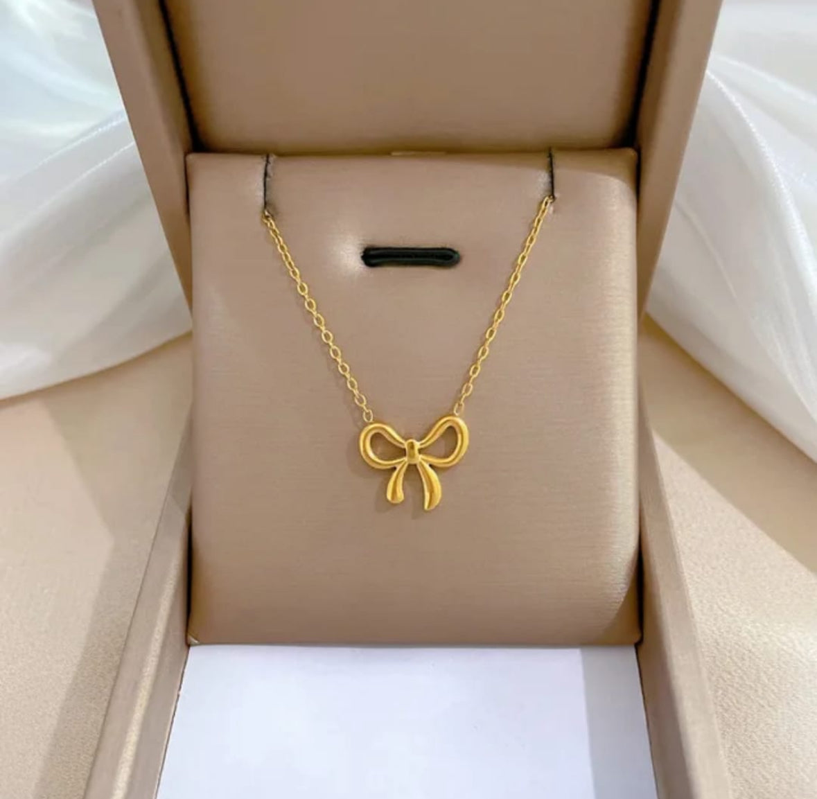Golden Bow Pendant Necklace