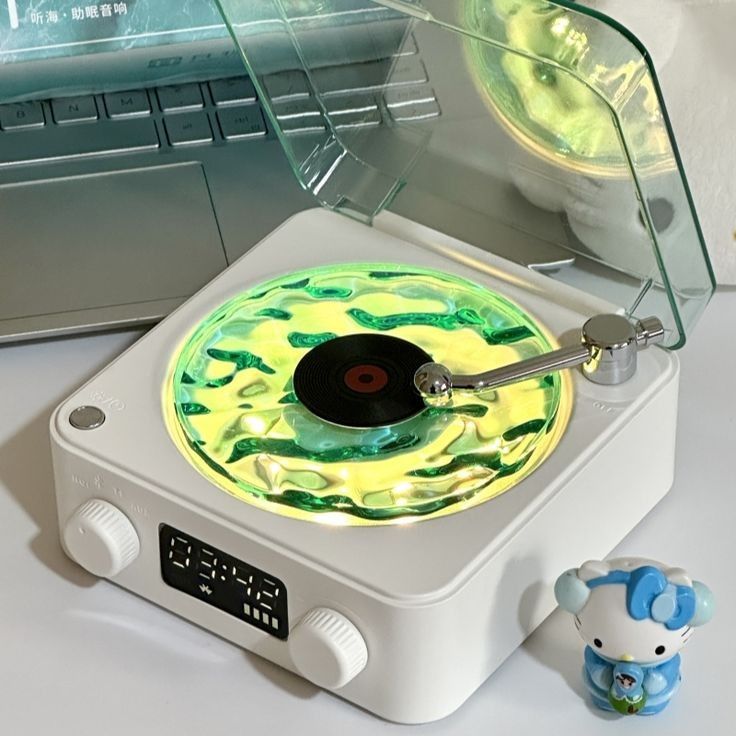 RetroWave™ 3-Speed Vinyl Player | Bluetooth + Built-in Speakers Multicoulour